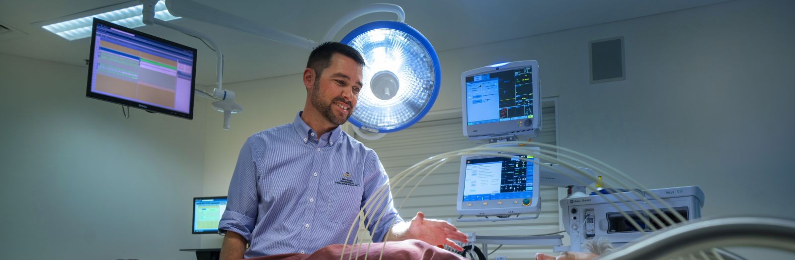 Image a radiation therapist setting up equipment for a medical procedure