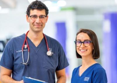 Thumbnail doctor and nurse standing together