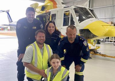 Back row: Rotorlift Pilot Thomas, Dr Anke and Andy from Ambulance Tasmania. Front row: Kieran and Maisie.