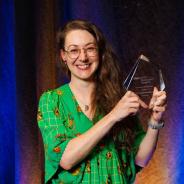 Tara Clayson-Fisher with award