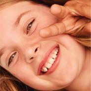 Image of a teenage girl smiling